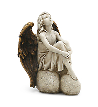 Angel Sitting On Stones